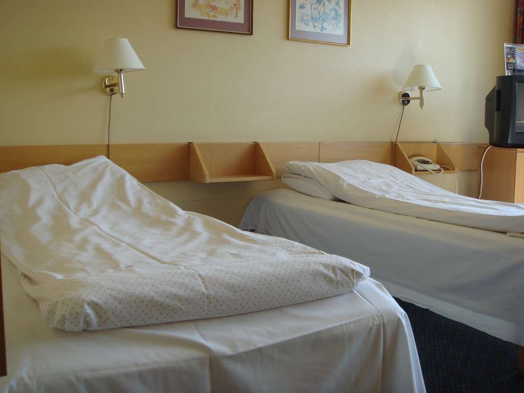 Dombas Hotel Quarto foto